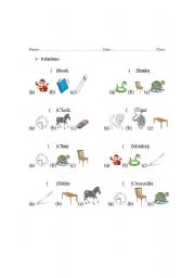 English worksheet: Animals, objects and colors.