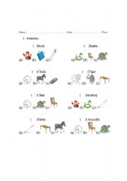 English Worksheet: Animals, objects and colors.
