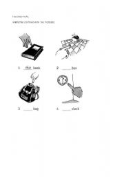 English worksheet: this and that