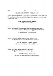 English Worksheet: Practice with articles a, an, the