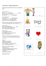 English Worksheet: Garth Brooks - Standing Outside the Fire