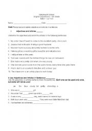 English worksheet: Adjectives and articles