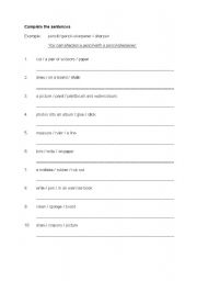 English worksheet: Easy sentences with verbs and nouns, Topic At School