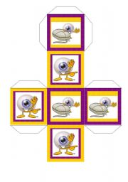 English Worksheet: Dice representing demonstratives.