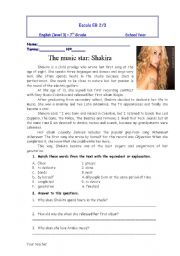 English Worksheet: text about shakira with questions