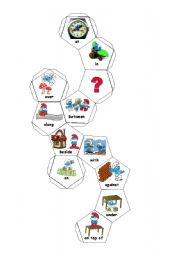 English Worksheet: 12 Sided dice with prepositions and sentence writing activity