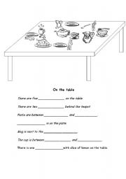 English worksheet: on the table