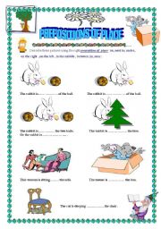 English Worksheet: describing pictures using the prepositions of place .