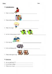 English worksheet: Present Continuous Exercises