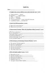 English worksheet: Articles, demostrative pronouns, possesive