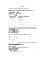 English Worksheet: Articles, demostrative pronouns, possesive