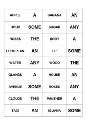 English Worksheet: Articles Dominoes