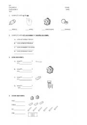 English worksheet: REVISION school objects- A or AN - colours- plural and singular.