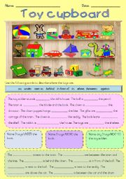 English Worksheet: Prepositions - Toy cupboard