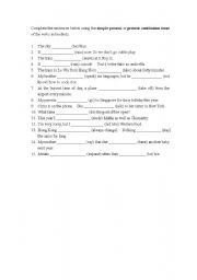 English worksheet: fill in the blanks with simple present and present continuous tense