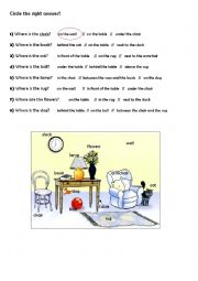 English Worksheet: Prepositions- Where is ...? (in a living room) multiple choice, beginners