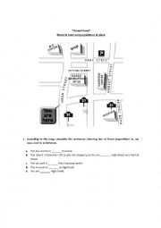 English Worksheet: Places in town and prepositions of place