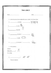 English Worksheet: demonstrative adjectives - there is - there are- prepositions of place. Engage Starter UNIT 5r 