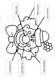 English Worksheet: Lets colour the clowns FACE