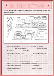 English Worksheet: PREPOSITIONS OF PLACE TO DESCRIBE A TOWN CENTRE + KEY