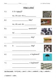 English Worksheet: What is this? Is it a__? Yes, it is a__. / No. It is not a__. Simple writing sheet