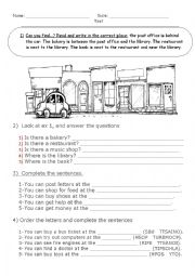English Worksheet: My town / test / prepositions / there is / shops