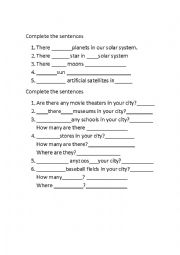 English Worksheet: Fill in the blanks: There is - There are