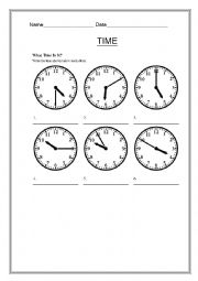 English Worksheet: What Time Is It?