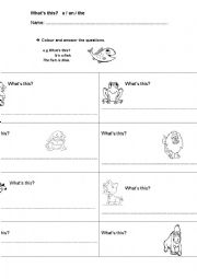 English Worksheet: a an the animals colours