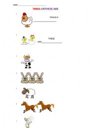 English Worksheet: THIS IS OR THESE ARE