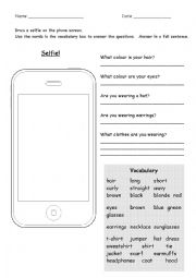 English Worksheet: Selfie - describing features and clothes