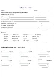 English Worksheet: Demostratives,to be and possessives. 