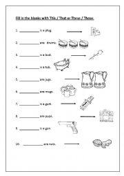 English Worksheet: fill in the blanks with This/That/These/Those