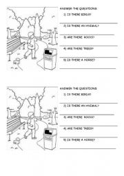 English Worksheet: THERE IS THERE ARE