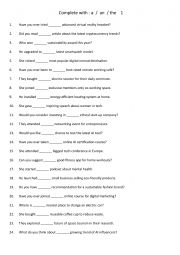 English Worksheet: Complete with  a    an   the   3